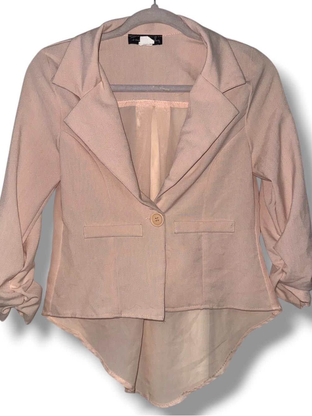 French Atmosphere light peach high low hem blazer